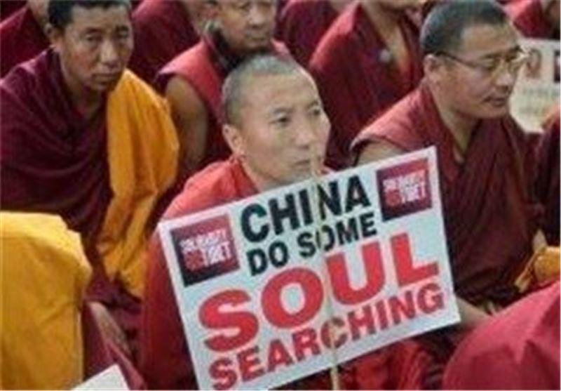 فعالین تبتی معترض به چین از ساختمان سازمان ملل در ژنو بالا رفتند