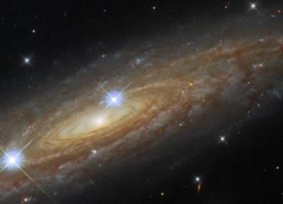 هابل عکسی خیره کننده از کهکشان مارپیچ نزدیک راه شیری گرفت